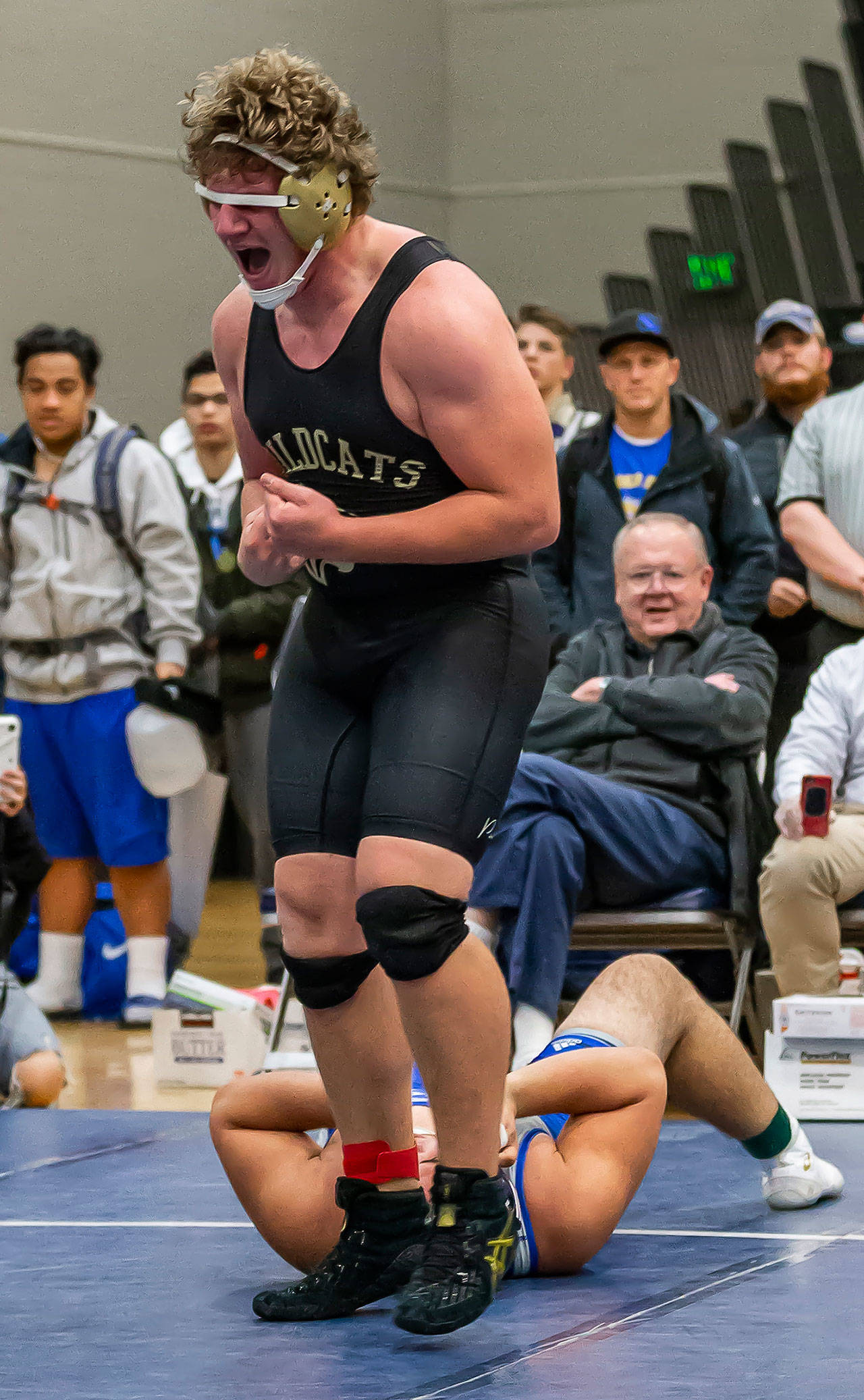 Oak Harbors Michael Fisken celebrates his win over top-ranked Dominick Mack of Squalicum. (Photo by John Fisken)
