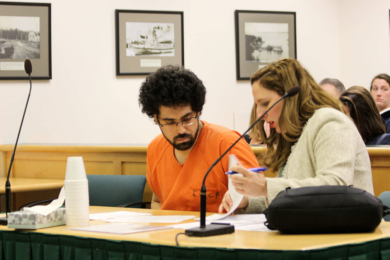 Photo by Jessie Stensland / Whidbey News-Times                                Guadalupe A. Ramos speaks with his attorney, Cassie Trueblood, in Island County Superior Court Monday. He was sentenced for rape.