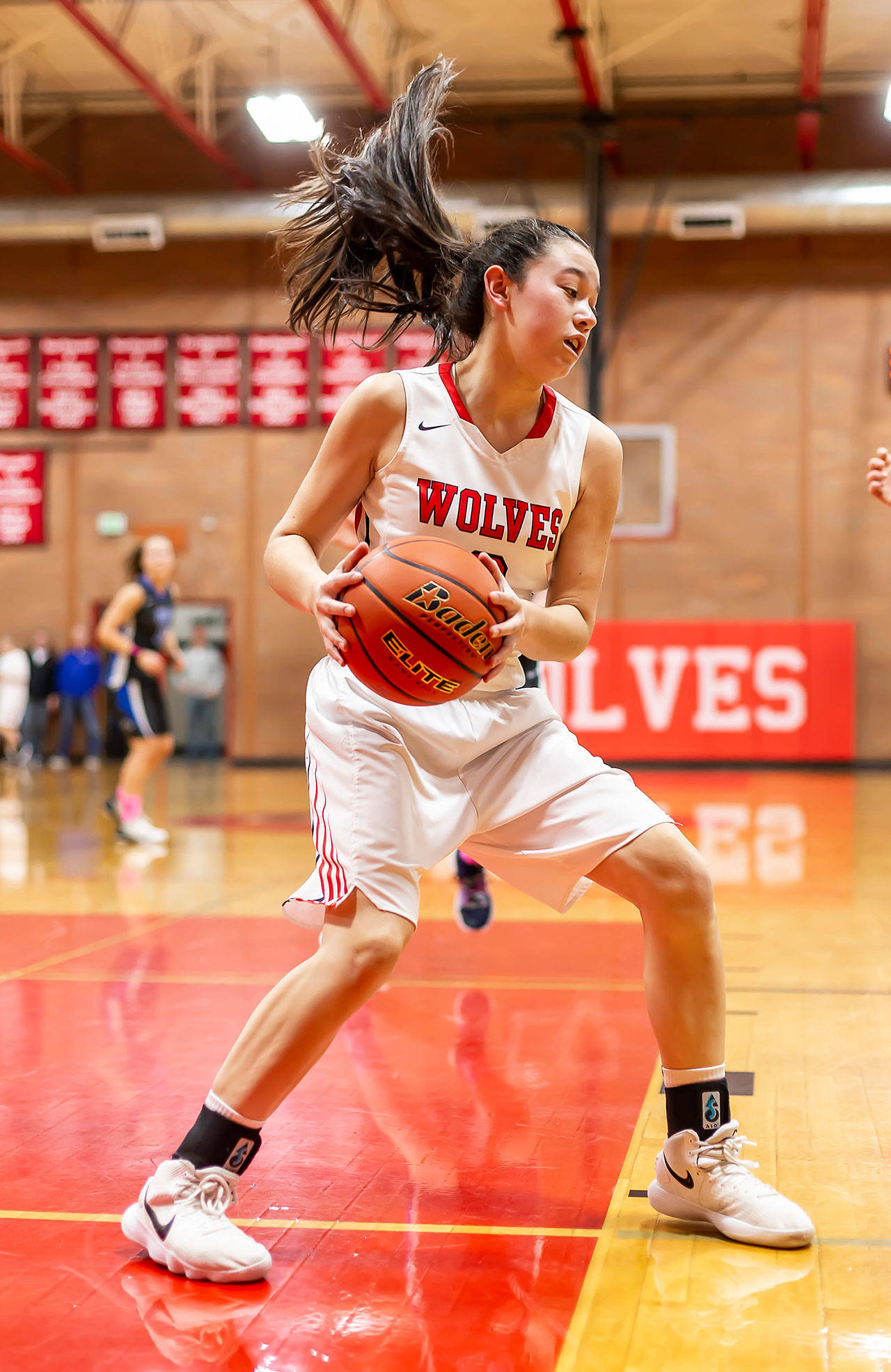 After grabbing a rebound, Scout Smith gets ready to head up court against South Whidbey.(Photo by John Fisken)