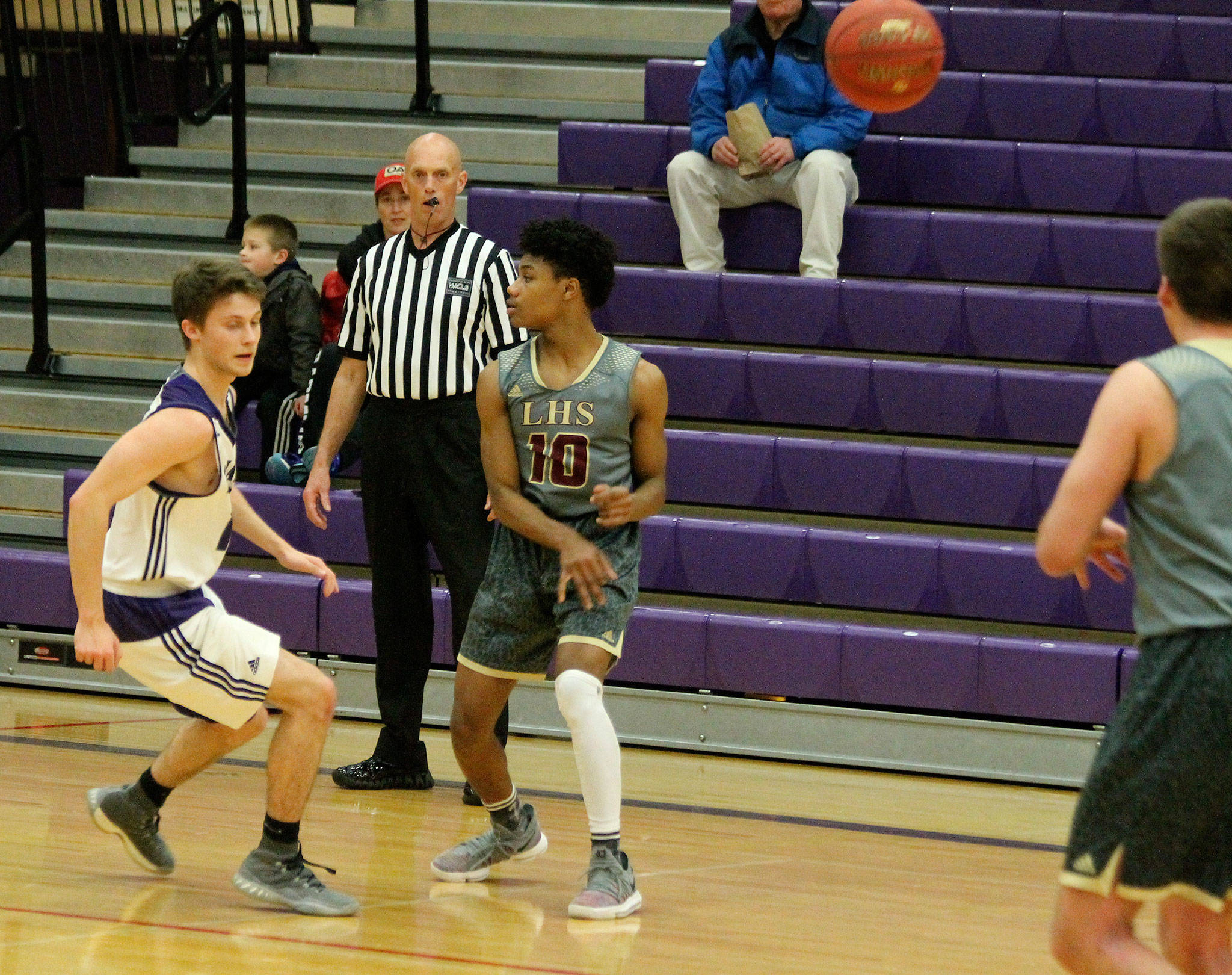 Hap Fakkema referees a high school district game between Anacortes and Lakewood last week. (Photo by Jim Waller/Whidbey News-Times)
