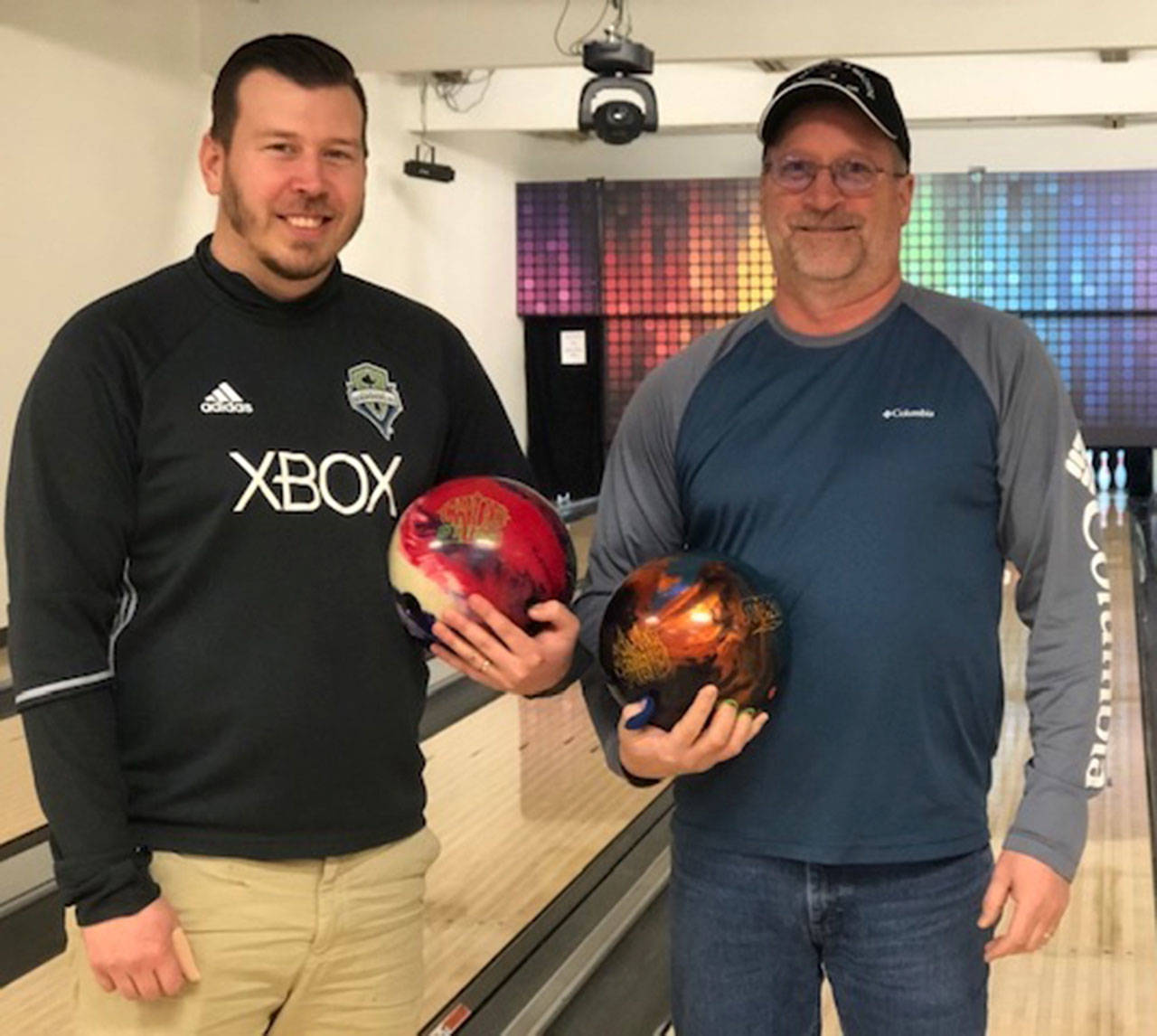 Ross Ramsdell, left, and James Ehlert each bowled a 300 game at the Whidbey Island USBC tournament earlier this month. (Submitted photo)