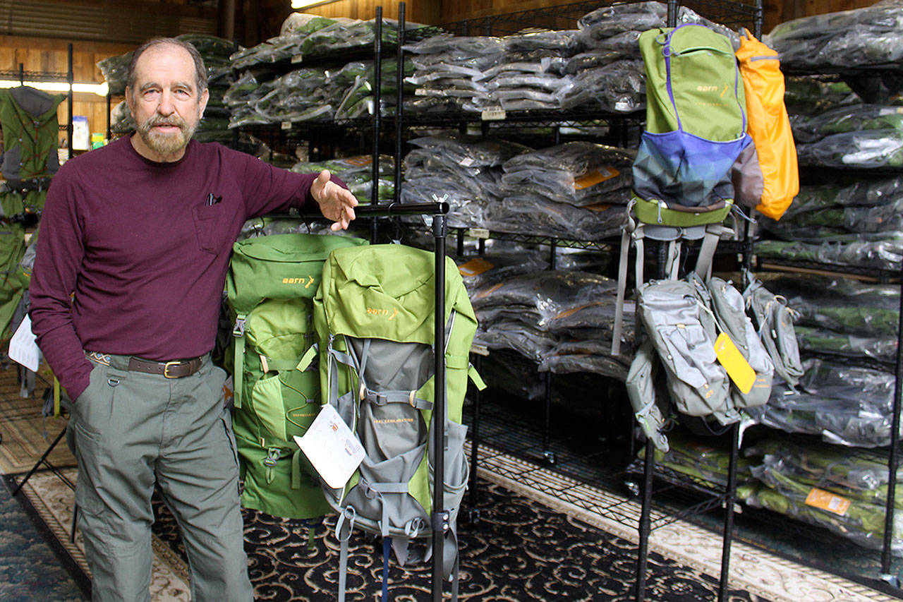 Rich Murphy uses an old barn as a warehouse for a line of backpacks called Aarn that are designed in New Zealand and sold worldwide. Murphy and his wife, Genie, are the new North American distributers for the backpacks that emphasis balance and reducing strain while hiking. (Photo by Patricia Guthrie/Whidbey News Group)
