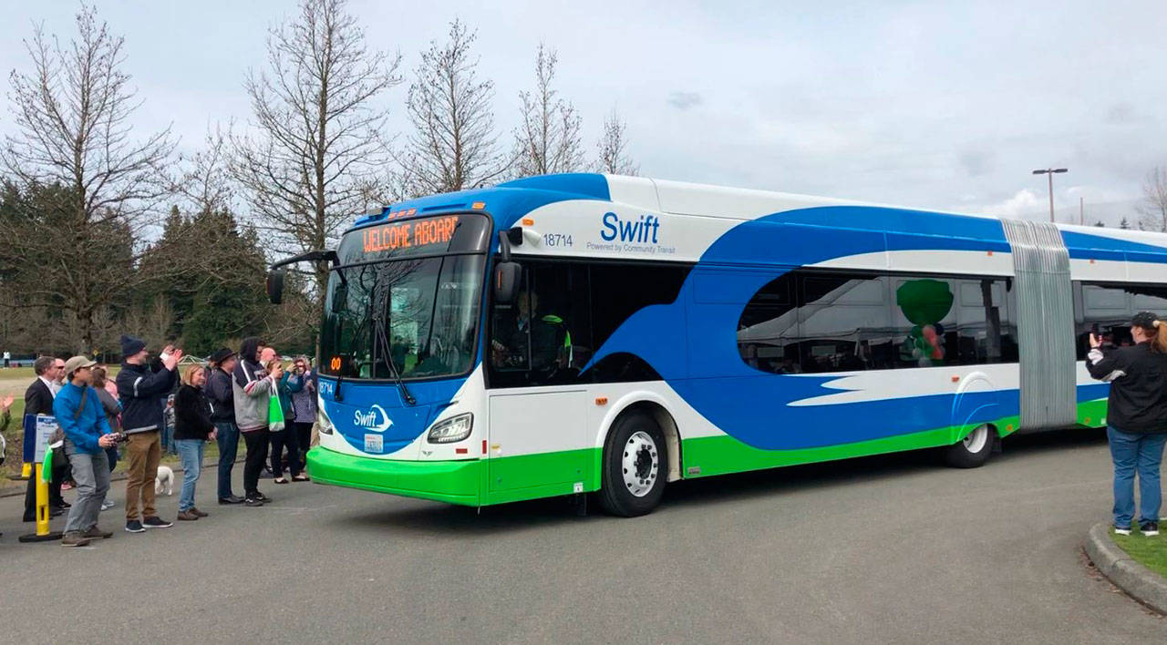 Snohomish County Community Transit’s new Swift Green Line buses began service this week, including routes between the Mukilteo Ferry Terminal and Paine Field’s commerical airline passenger terminal. Shuttle van service between Whidbey Island and Paine Field begins Thursday. (Photo provided)