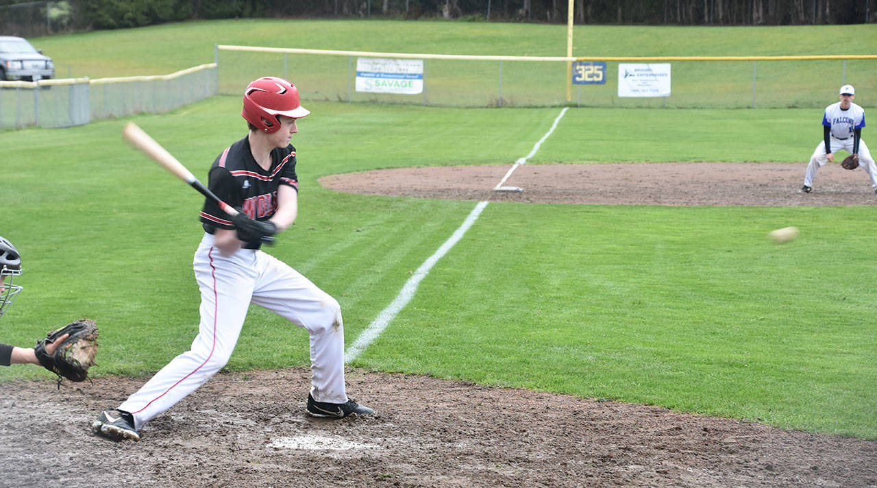 Coupeville’s Seth Weatherford attacks a pitch in Wednesday’s game at South Whidbey.(Photo by Karen Carlson)