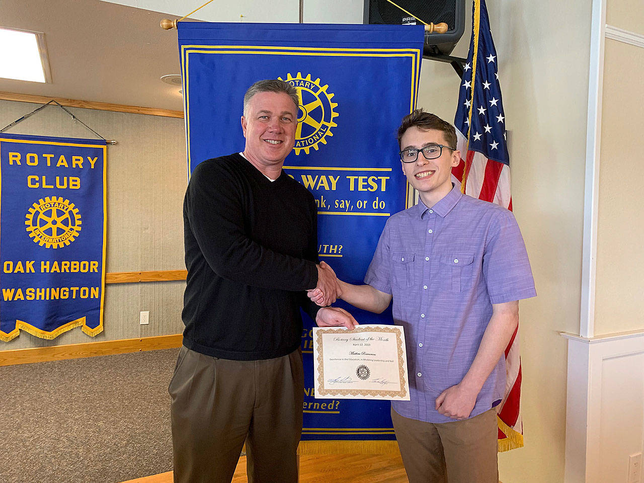 Photo provided.                                Todd Krantz presents Matthew Rosencrans with his certificate.