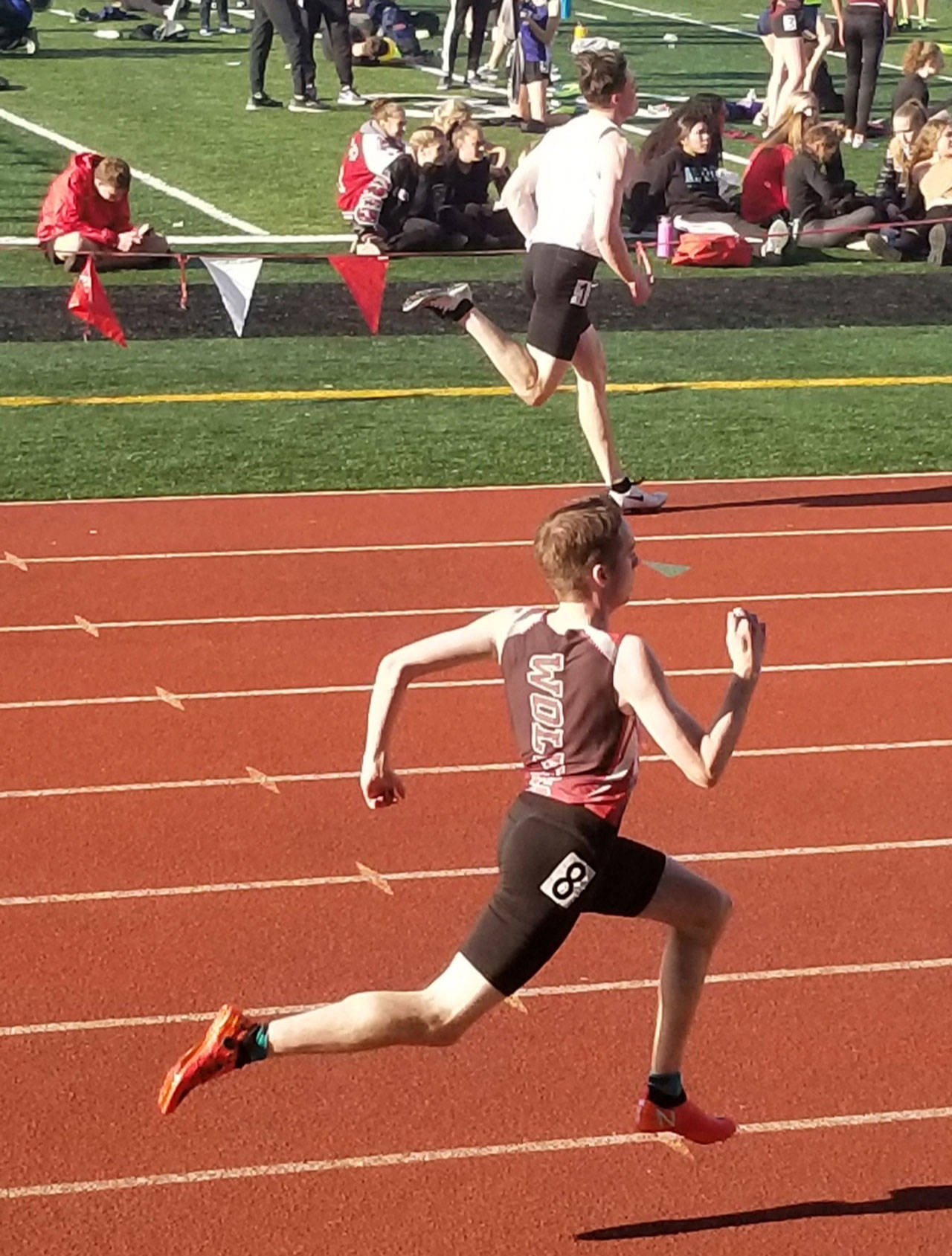 Coupeville’s Danny Conlisk, bottom, runs to second place in the 400 meters Saturday. (Submitted photo)