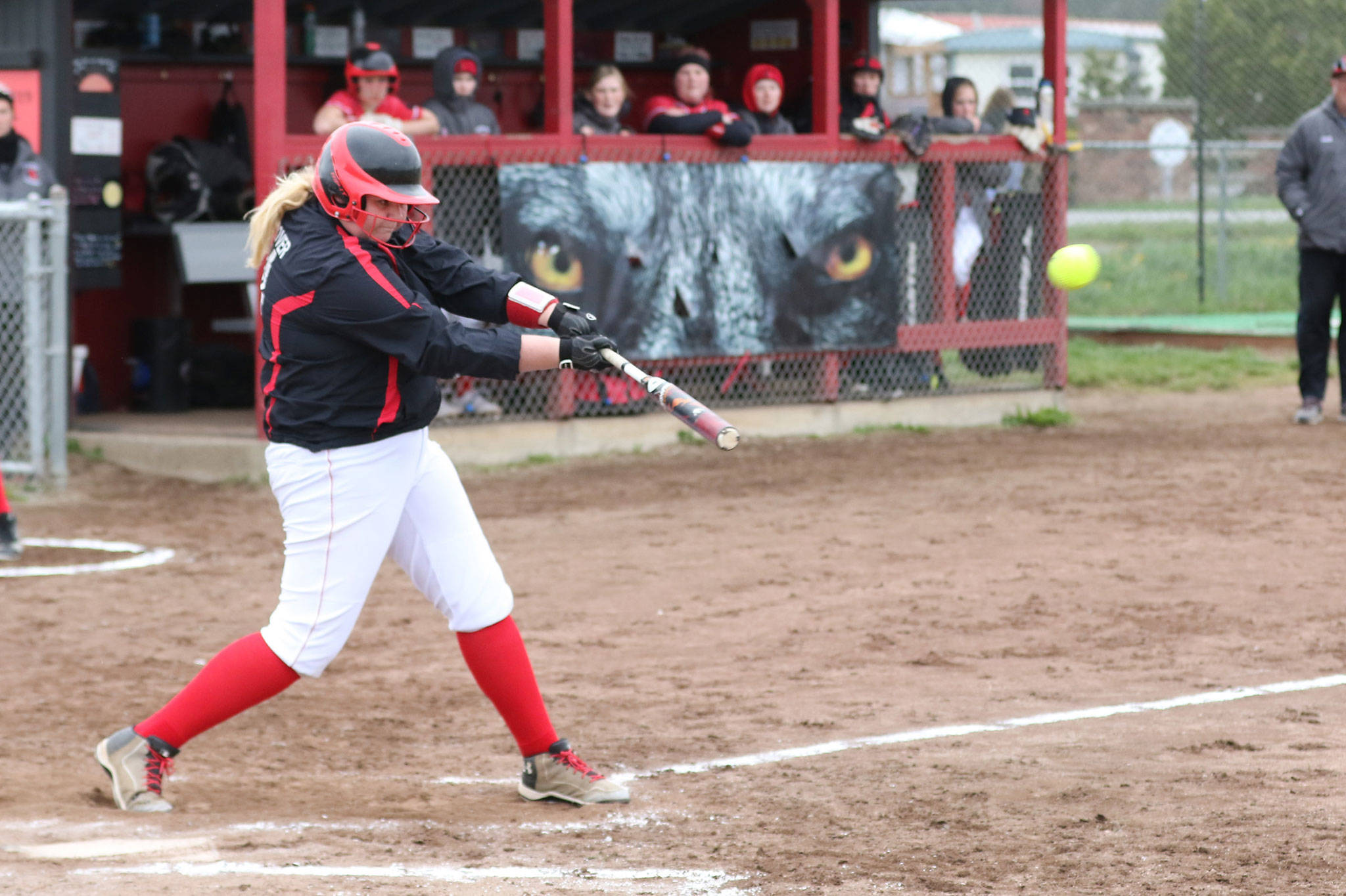 Coupevilles Veronica Crownover thumps a first-inning grand slam to jump start the Wolves offense Tuesday. (Photo by John Fisken)