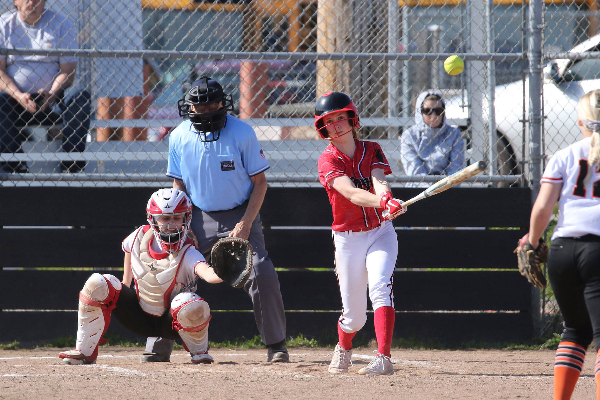 Coupeville’s Coral Caveness raps one of her four hits in Wednesday’s win over Granite Falls.(Photo by John Fisken)