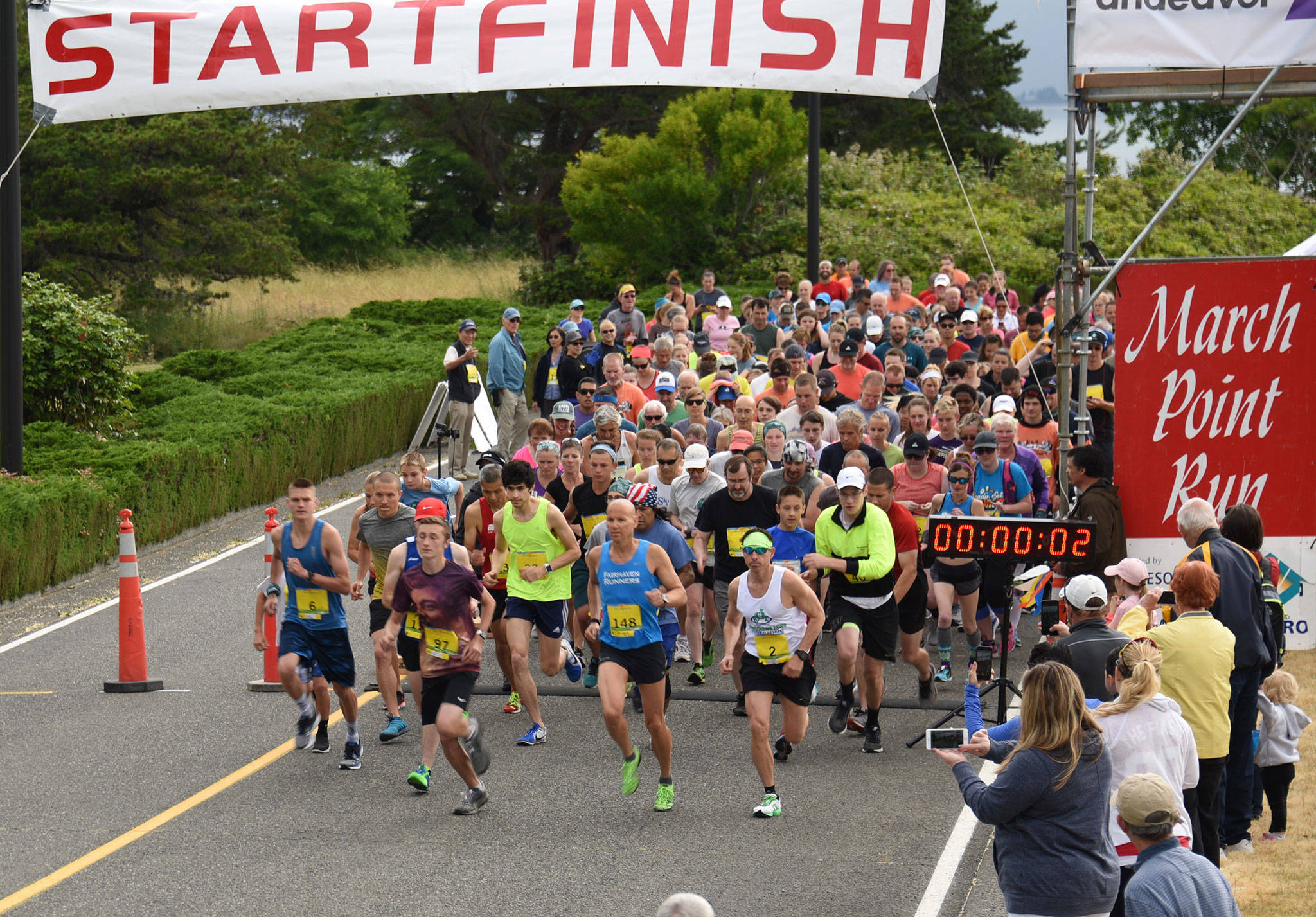 Runners take off at the beginning of a recent March Point Run and Walk. This year’s event is June 22. (Submitted photo)