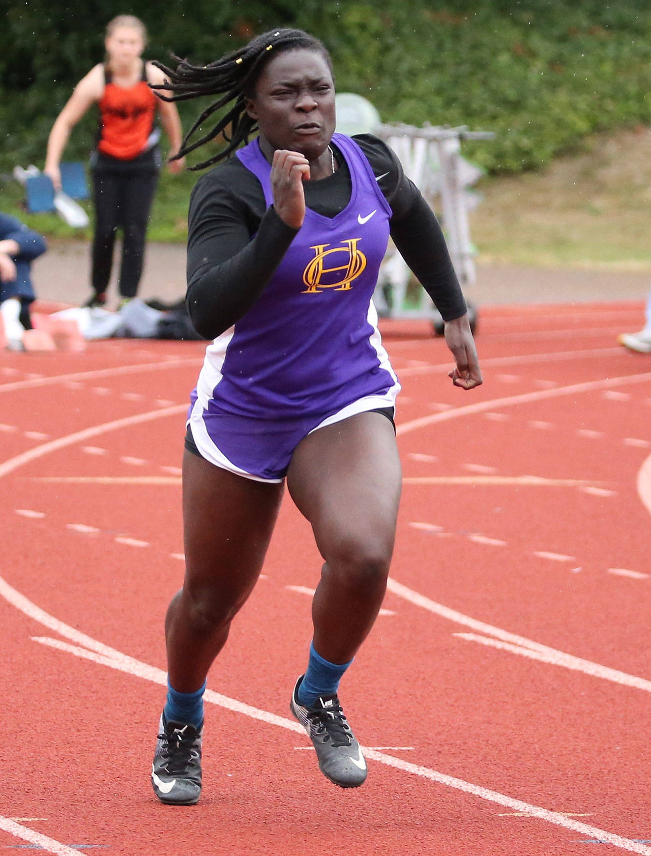 Maria Dailey sprints to a sixth-place finish in the preliminaries of the 100 meters.(Photo by John Fisken)