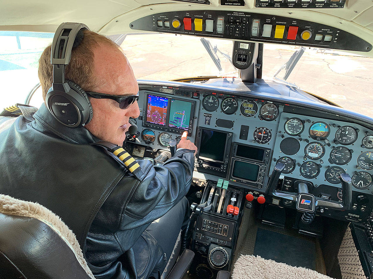 Chris Taylor, a retired Navy pilot, and his wife Helen Taylor recently founded a new flight service out of Whidbey.