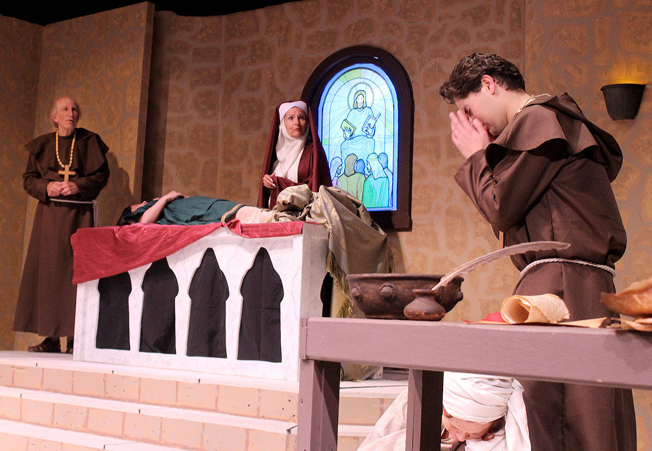 Sibling rivalry ensues — among other tiffs — once Agatha, brillantly played by Jacqueline Davis, appears on the scene in the play, “Incorruptible.” She’s both a Catholic Sister and sister to Abbot Charles, played by Kevin Wm. Meyer, far left. Caught in the fray is Brother Felix, right, played by Warren Rogers. Lying on the alter, playing a not-so-dead saint, is Diana Collette. Photos by Patricia Guthrie/Whidbey News-Times