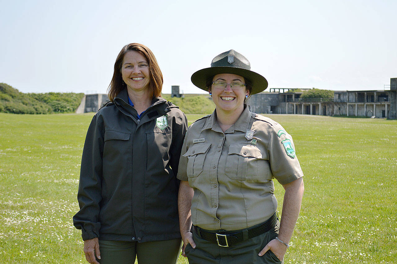 Program Specialist Sharon Young-Hale and Interpretative Specialist Jackie French, with Washington State Parks, stand in the field at Fort Casey where Yachts of Fun will take place Saturday. State Parks is hosting the large, free water- and boat-safety event as well as several other programs throughout the summer. Photo by Laura Guido/Whidbey News-Times