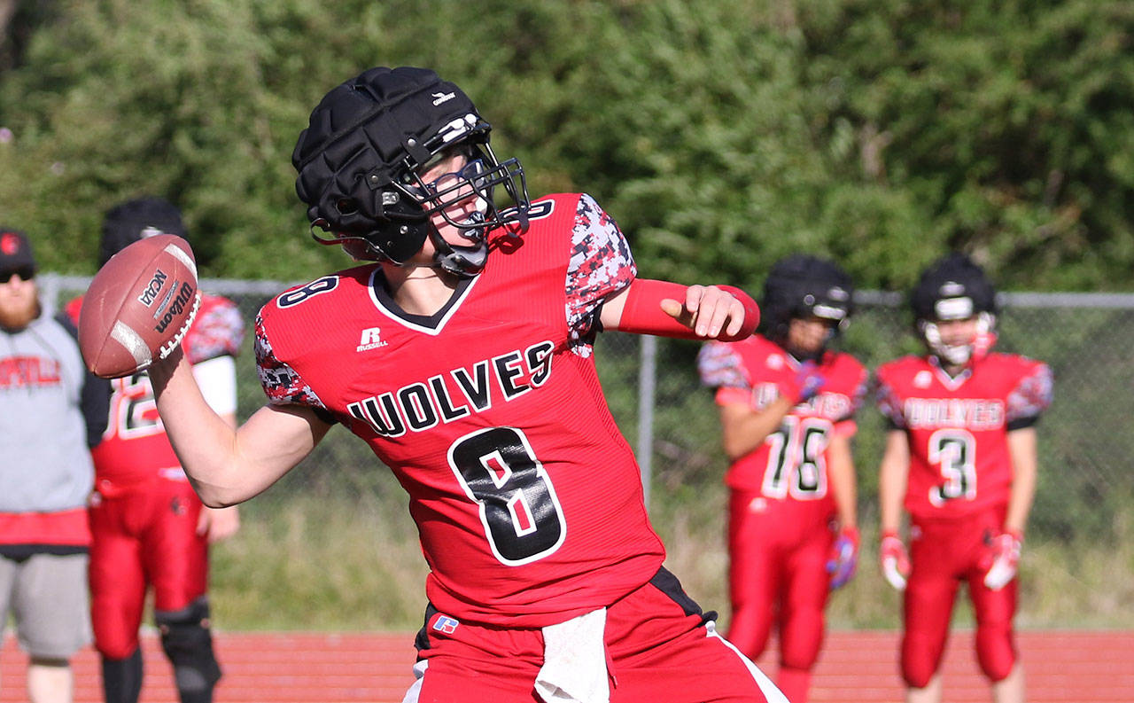 Coupeville quarterback Dawson Houston launches a pass in Thursday’s spring scrimmage with Concrete. (Photo by John Fisken)