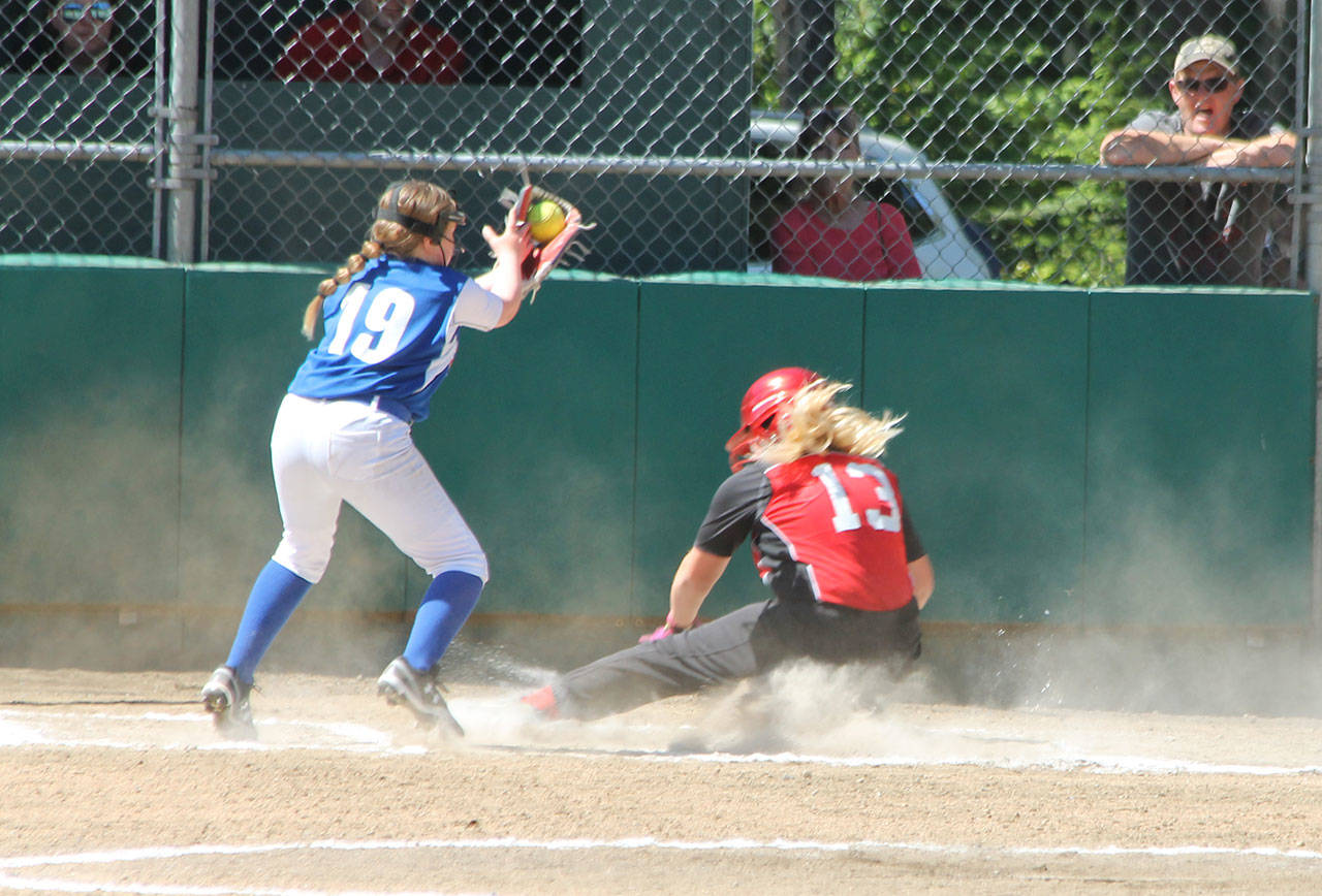 Finally, McMillan scores on a wild pitch.(Photo by Jim Waller/Whidbey News-Times)