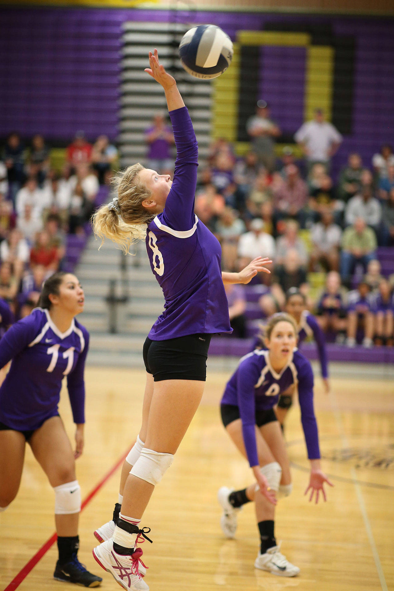Female Athlete of the Year Cami Bristow goes for a kill during a match last fall. (Photo by John Fisken)