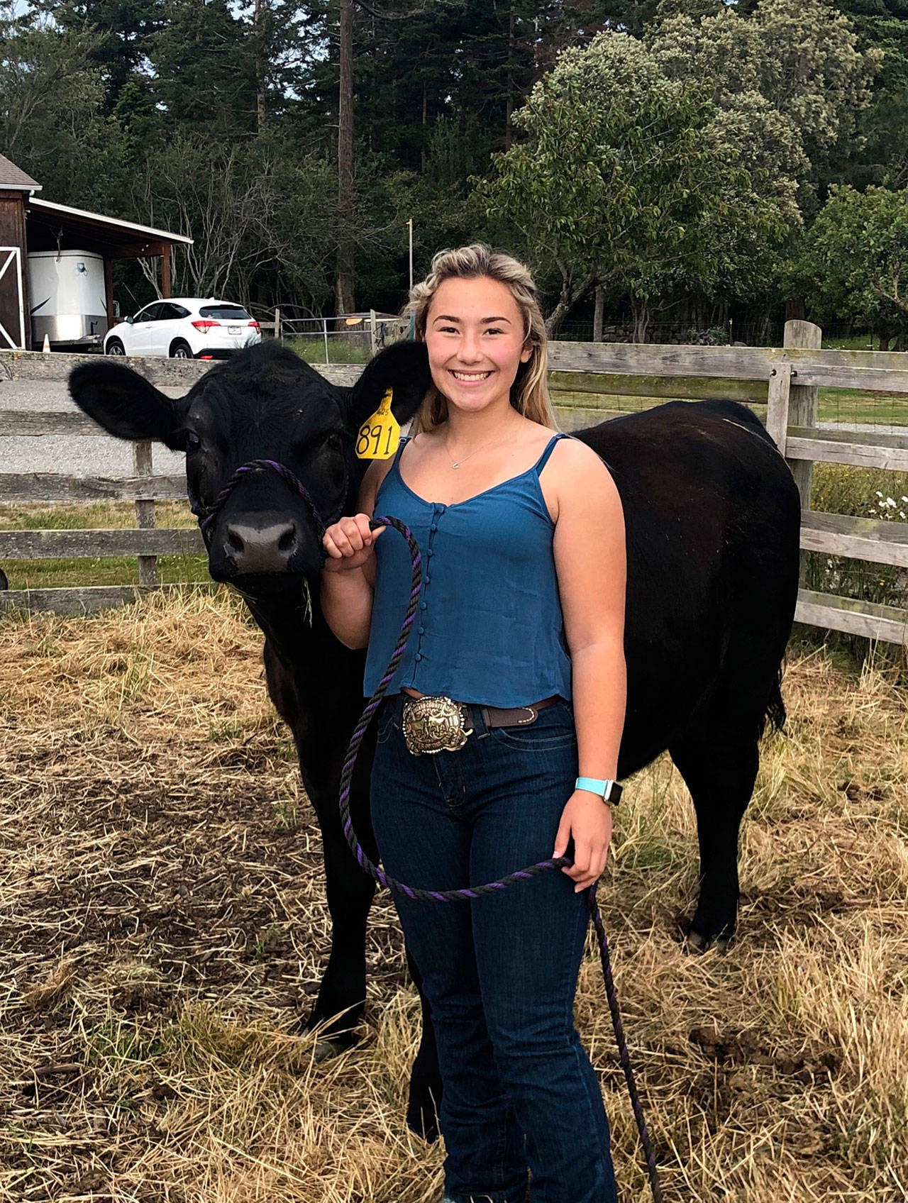 Camden Miller with her steer, Jimmy. Miller purchased Jimmy in December when he was 6 months old. In past years, Miller participated in various 4-H classes at the fair with her horses and is excited to try something new this year, she said. (Photo provided)