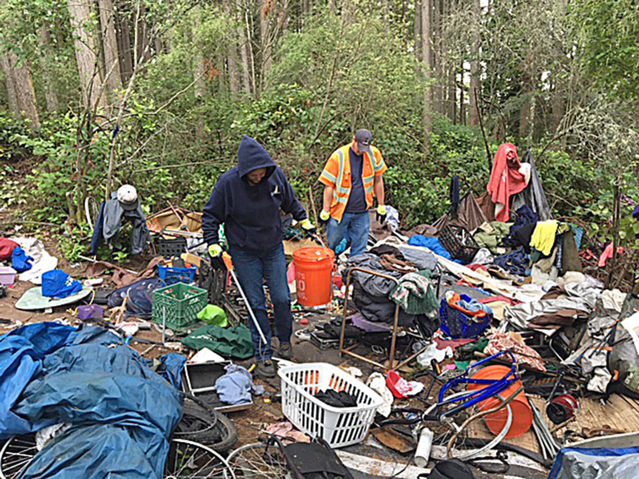 A work crew cleans up city property. (Photo provided by Oak Harbor Police Department)