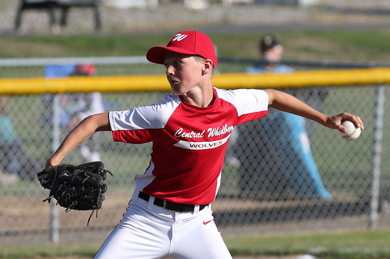 Landon Roberts delivers a pitch for Central Whidbey.(Photo by John Fisken)