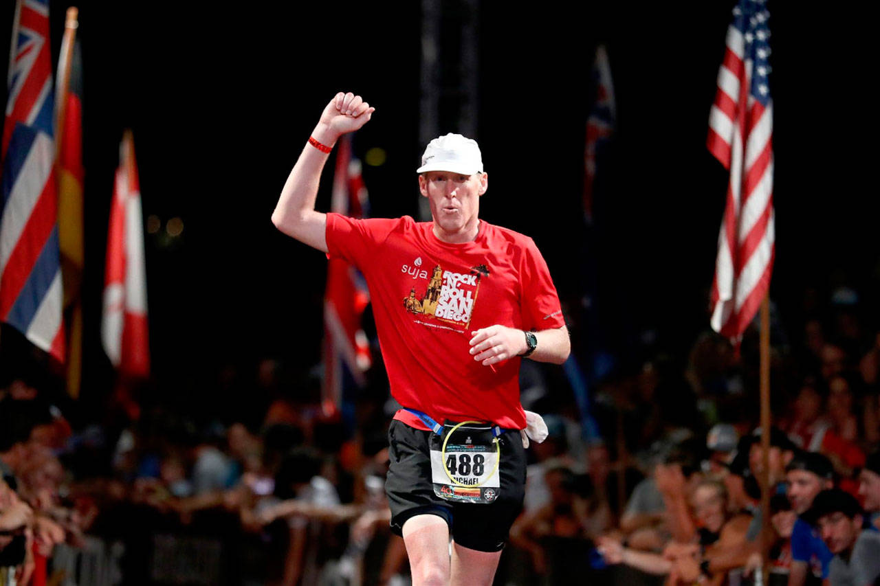 Michael Collins finishes the Ironman in 2018. He tires to respresent his family, the founders of the event, at the Ironman at least once every five years. (Submitted photo)