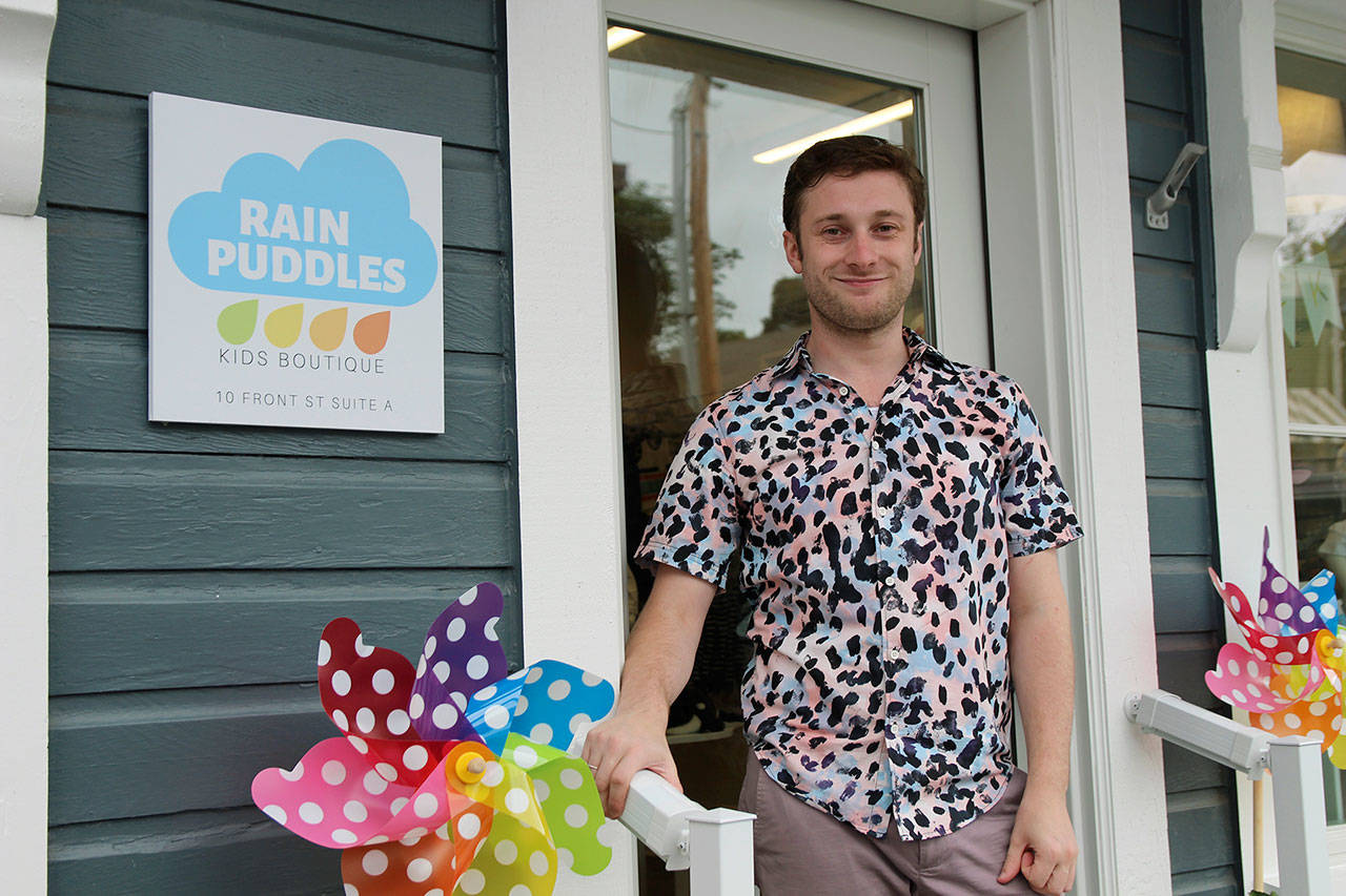 Christian Chambers, in addition to Rain Puddles Kids Boutique, owns Aqua Gifts a few buildings down the street. (Photos by Maria Matson/Whidbey News-Times)