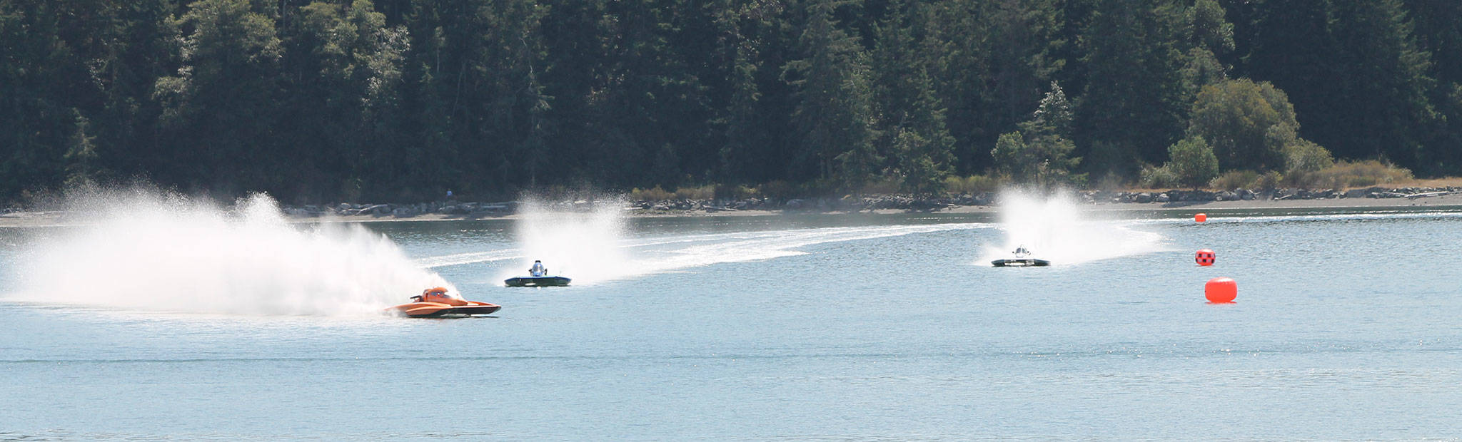 Hydros head into the turn during one of Sunday’s heats. (Photo by Jim Waller/Whidbey News-Times)