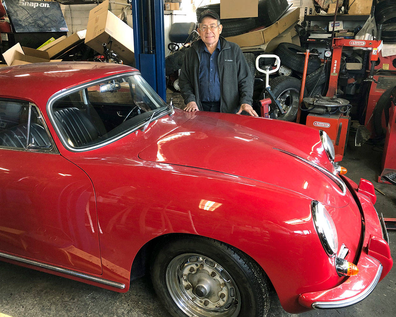 Marty Robinett with a customer’s ‘62 Porsche he is repairing. Robinett has many years of experience working on cars of all kinds. Photos by Harry Anderson