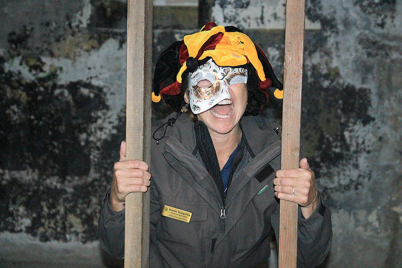 There’s no telling what visitors will encounter in Haunted Fort Casey this year. Program Specialist Sharon Young-Hale thought of and organizes the effort that attracted more than 2,800 people to the park last year. Photo by Laura Guido/Whidbey News-Times