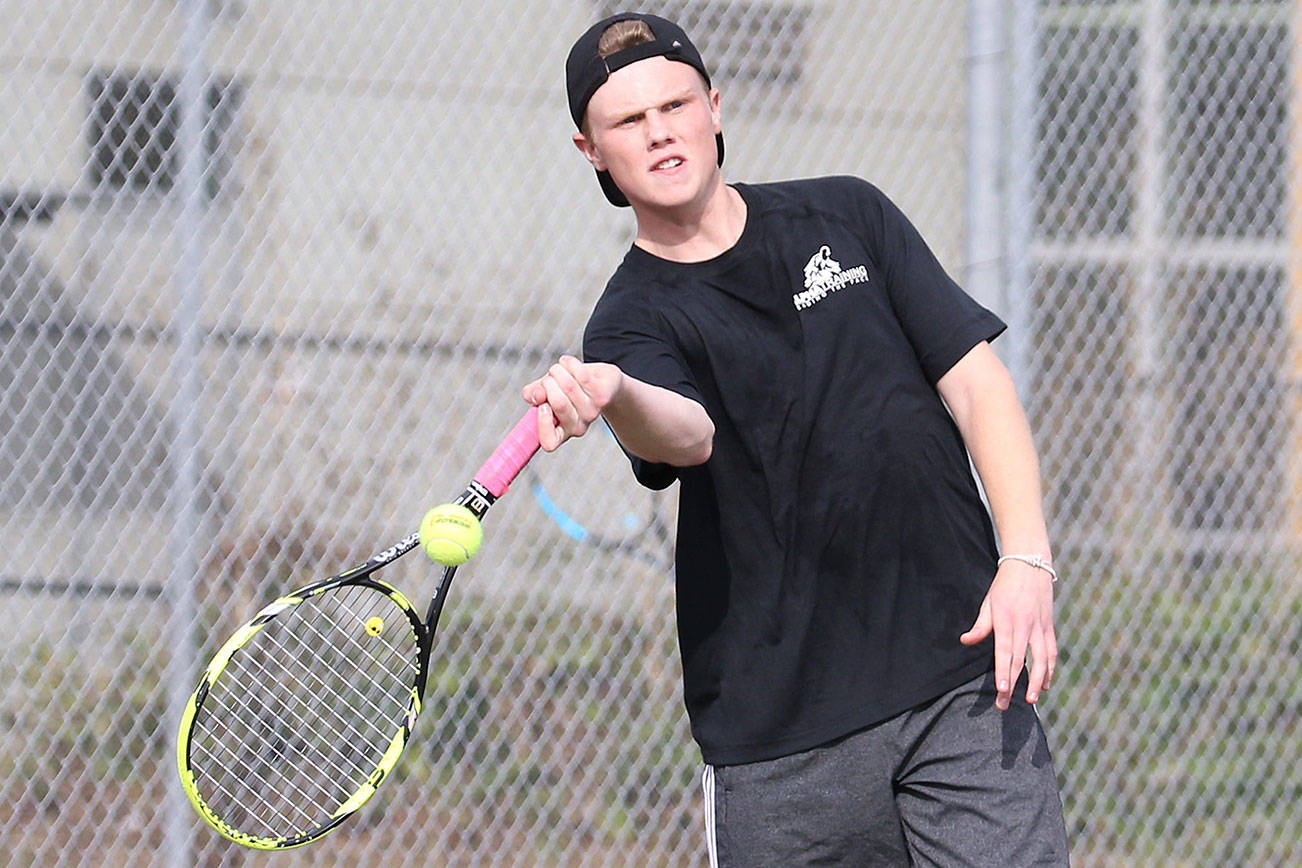 Grove grabs only Wolf win at bi-district / Tennis