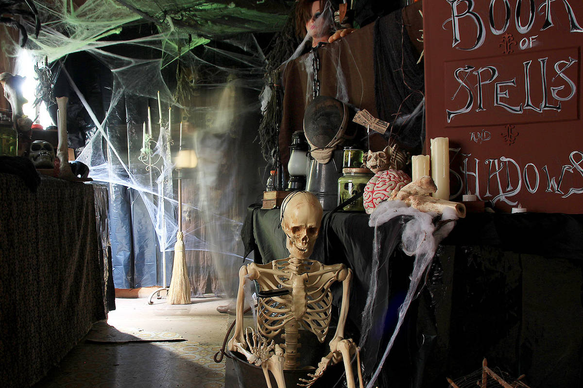 An apparition appears in the background of the Haller haunted house. Photo by Laura Guido/Whidbey News-Times