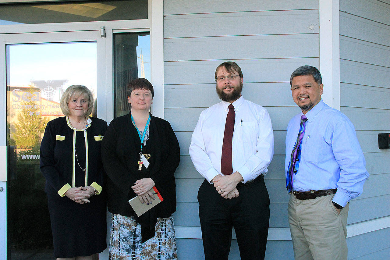 Photo by Laura Guido/Whidbey News-Times                                From left, WhideyHealth Chief Quality Officer Linda Gipson, Sea Mar Clinical Supervisor Sonya Lohr, Sea Mar Medication Assisted Treatment Program Director Charles Watras, and Program Manager Emmanuel Montenegro at the Sea Mar office in Oak Harbor.