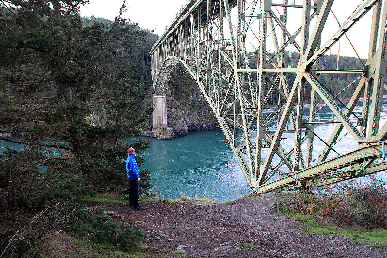 State Rep. Jake Fey, D-Tacoma, examines Deception Pass Bridge Wednesday morning. The House Transportation Committee chairman was accompanied by Dave Paul, D-Oak Harbor, on a tour of Whidbey’s transportation project needs.