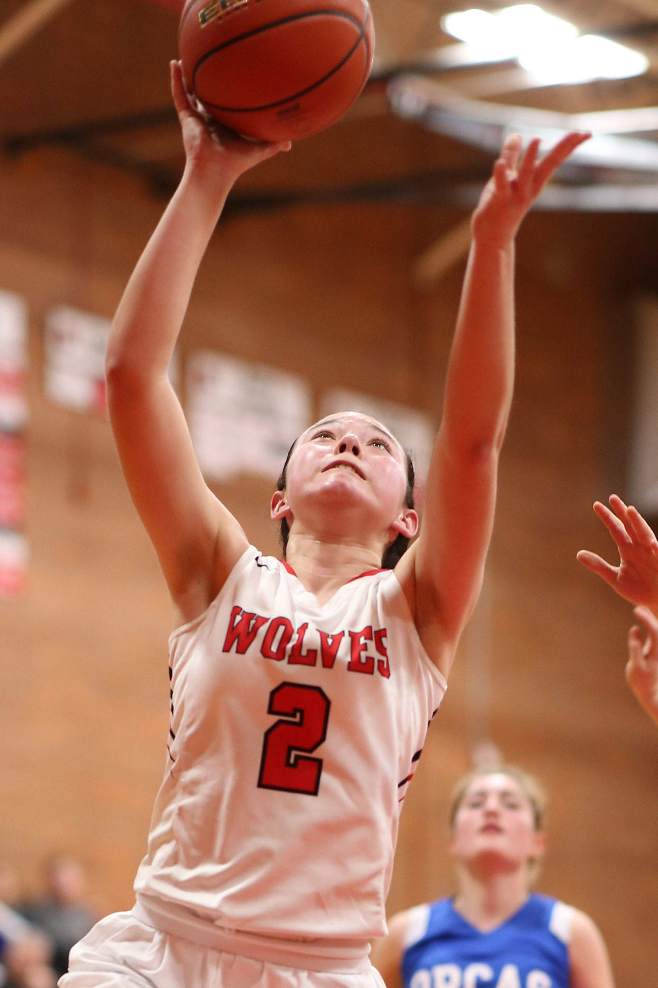 Scout Smith scores 2 of her 11 points in Coupeville’s win over Orcas Island Saturday.(Photo by John Fisken)