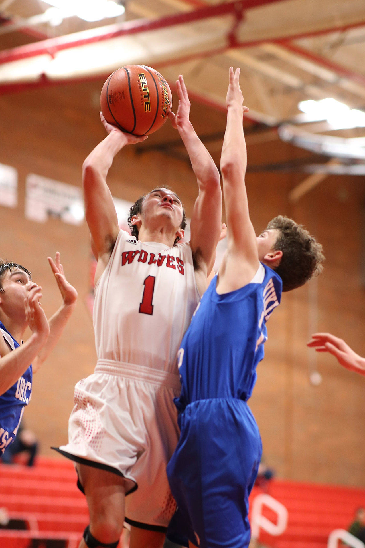 Coupeville’s Jered Brown powers to the hoop to help the Wolves defeat Orcas Island Saturday. (Photo by John Fisken)