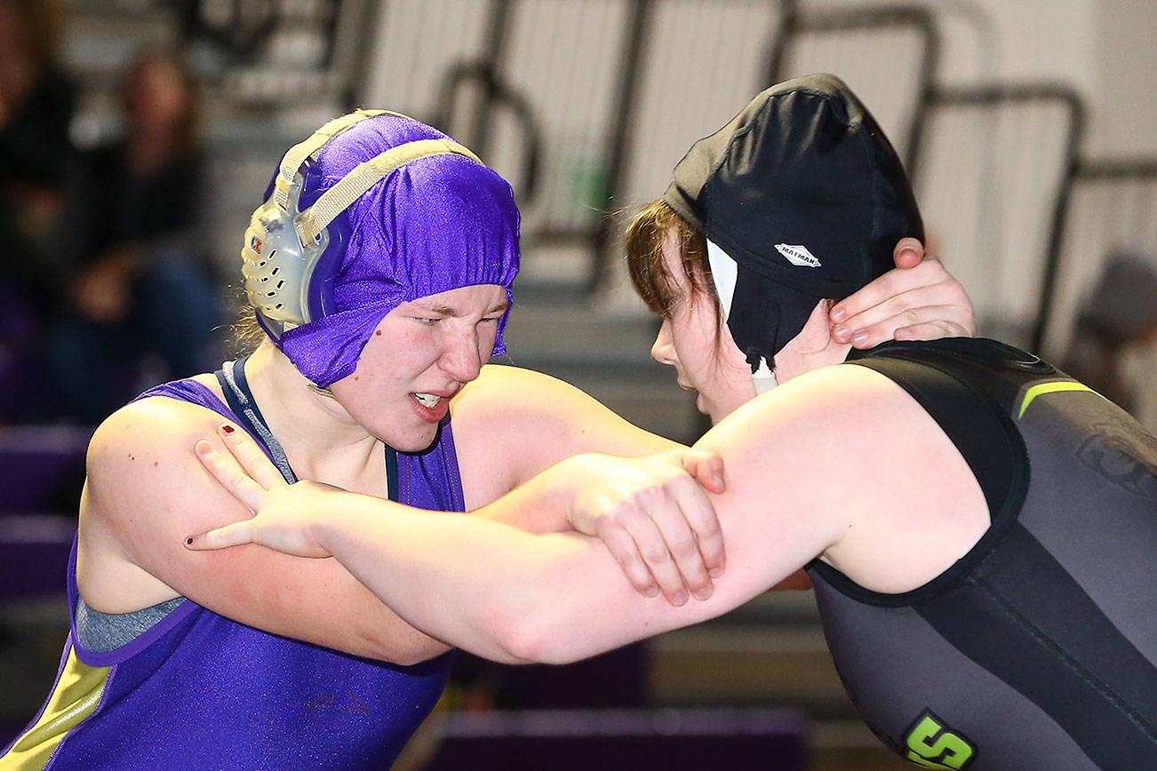 Wildcats hold 1st home match / Girls wrestling