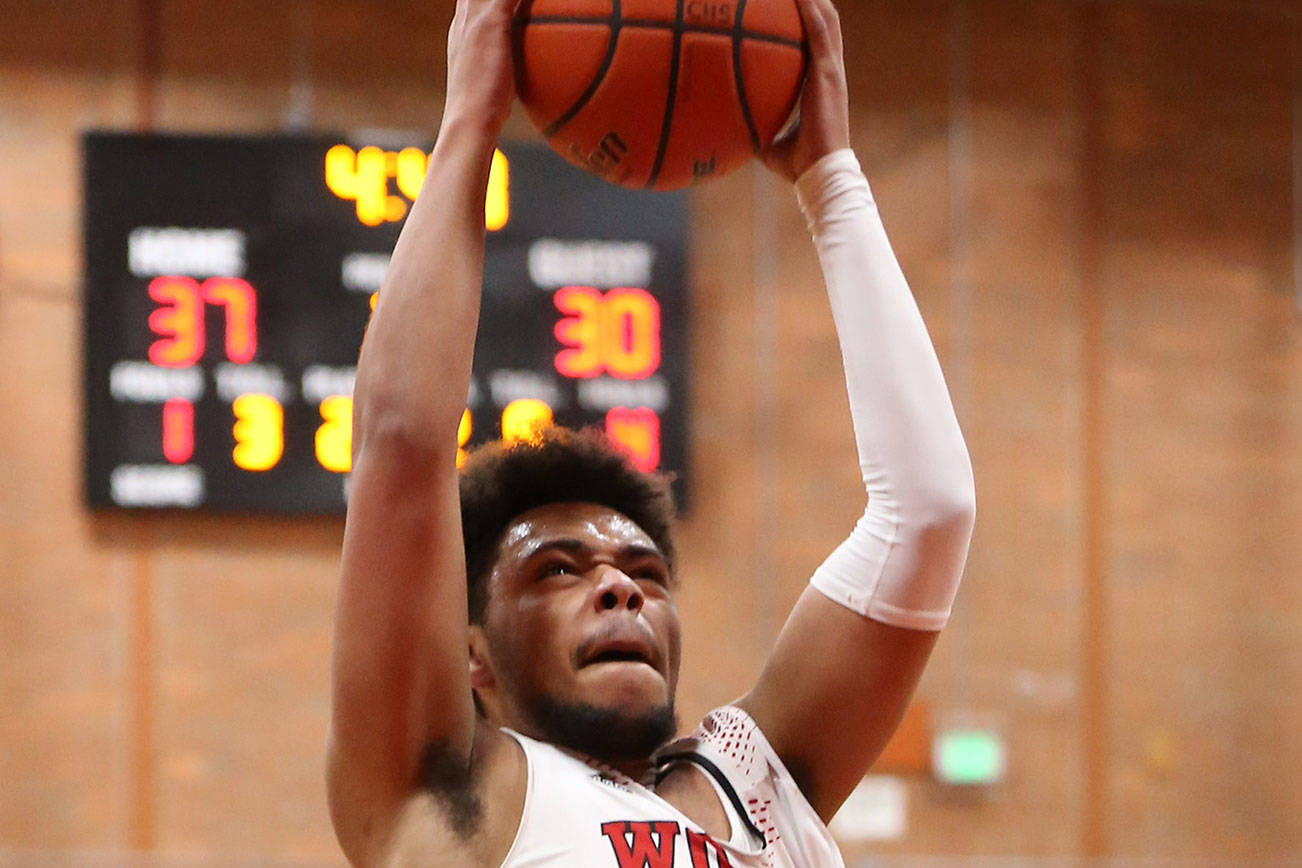 Turks rally to topple Wolves / Boys basketball
