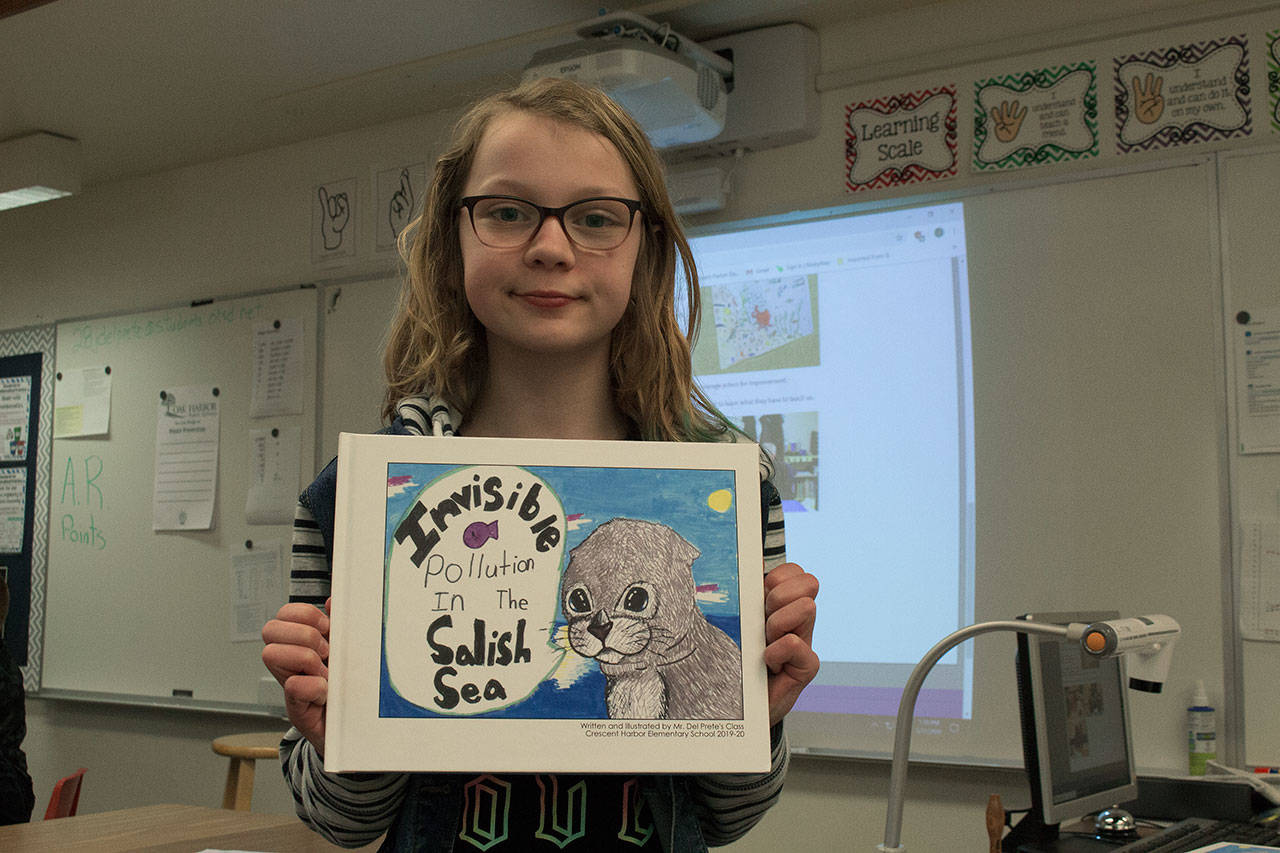 Photo by Brandon Taylor/Whidbey News-Times Peyton Bodenhafer, 10, drew a seal for the cover of the book.