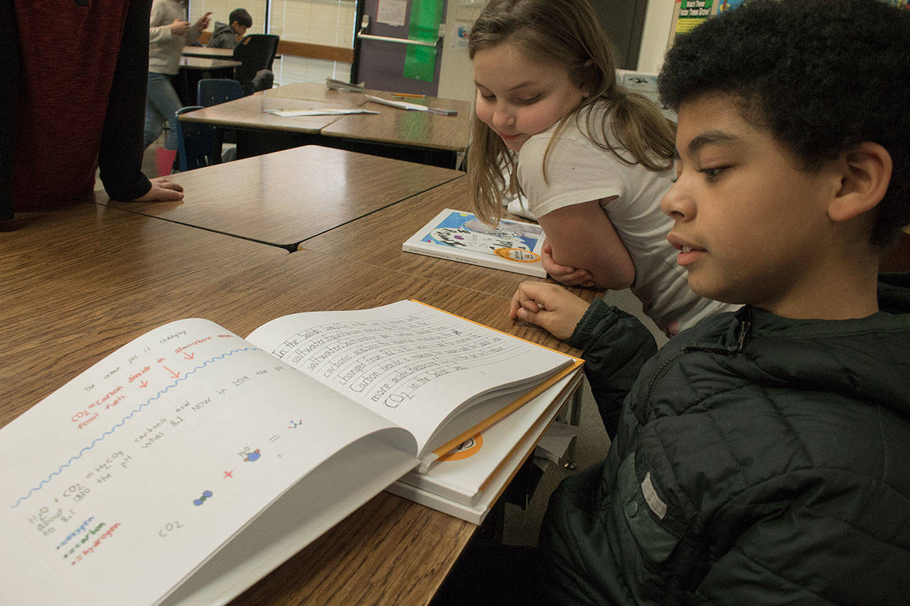 Photo by Brandon Taylor/Whidbey News-Times                                The students underwent a rigorous editing process. Rashad Mack, 9, said he feels good now that the book has been published.