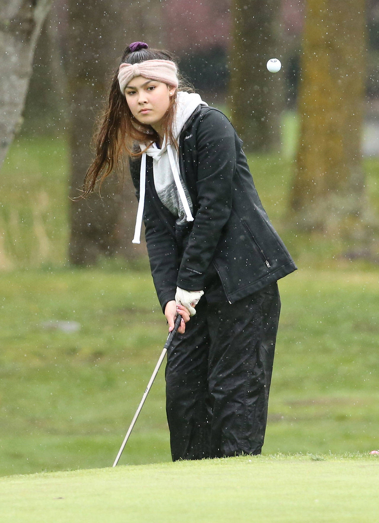 Natasha Decker is one of four returning seniors for the Oak Harbor girls golf team. (Photo by John Fisken)