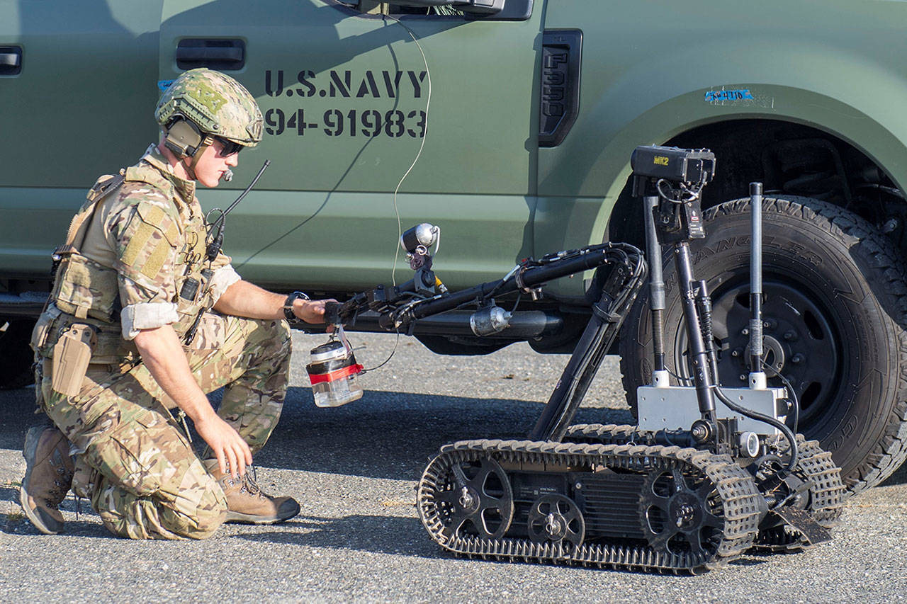 Lt. Nick Woods, attached to Explosive Ordnance Disposal Mobile Unit (EODMU) 5, controls a Mark II Talon remotely operated vehicle (ROV) during a Certification Exercise (CERTEX) on Naval Air Station Whidbey Island, Wash., July 16. Elements of EODMU-1 and EODMU-5 qualified as ready for future operational deployments during the CERTEX, which centered on integrating the two units’ Sailors with a goal of building a cohesiveness that will help them counter undersea threats and contribute to winning the high-end fight once deployed in support of Navy and geographic combatant command mission priorities. U.S. Navy EOD is the world’s premier combat force for eliminating explosive threats so the Fleet and nation can fight and win wherever, whenever and however it chooses. U.S. Navy photo by Mass Communication Specialist 2nd Class Marc Cuenca/Released