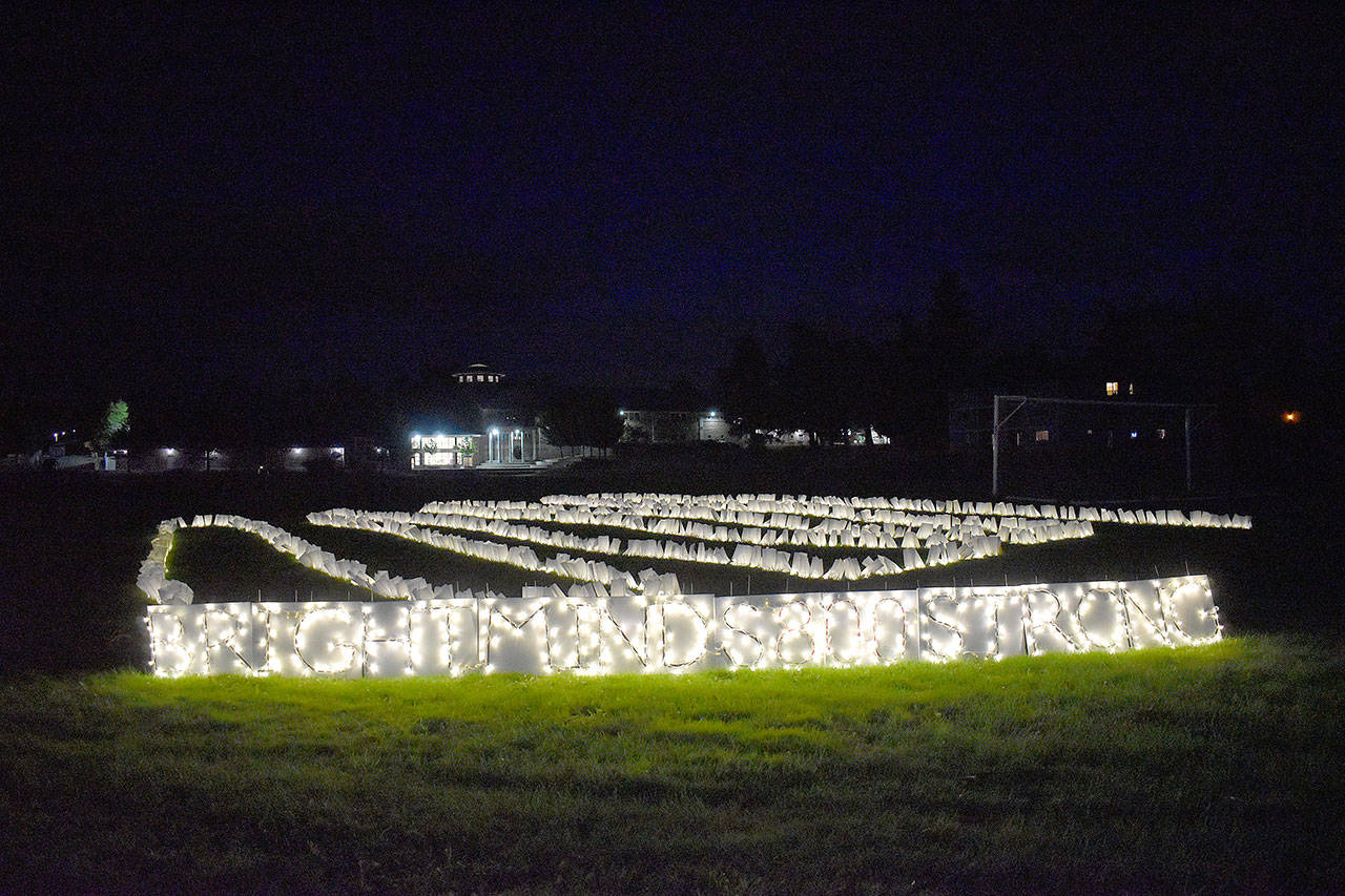 Volunteers placed 800 lights on the atheltic field at North Whidbey Middle School Friday night in an effort to connect with the community while students stay home because of COVID-19. Photo by Emily Gilbert/Whidbey News-Times
