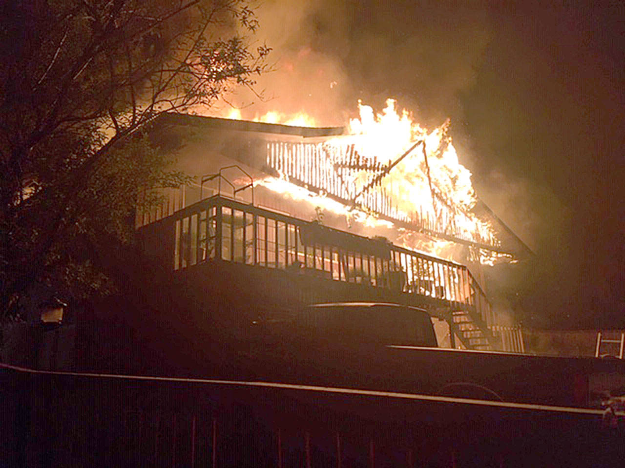 A house fire in Admiral’s Cove just after midnight Wednesday dispalced three adults, but there were no injuries. Submitted by CWIFR Deputy Chief Charlie Smith.