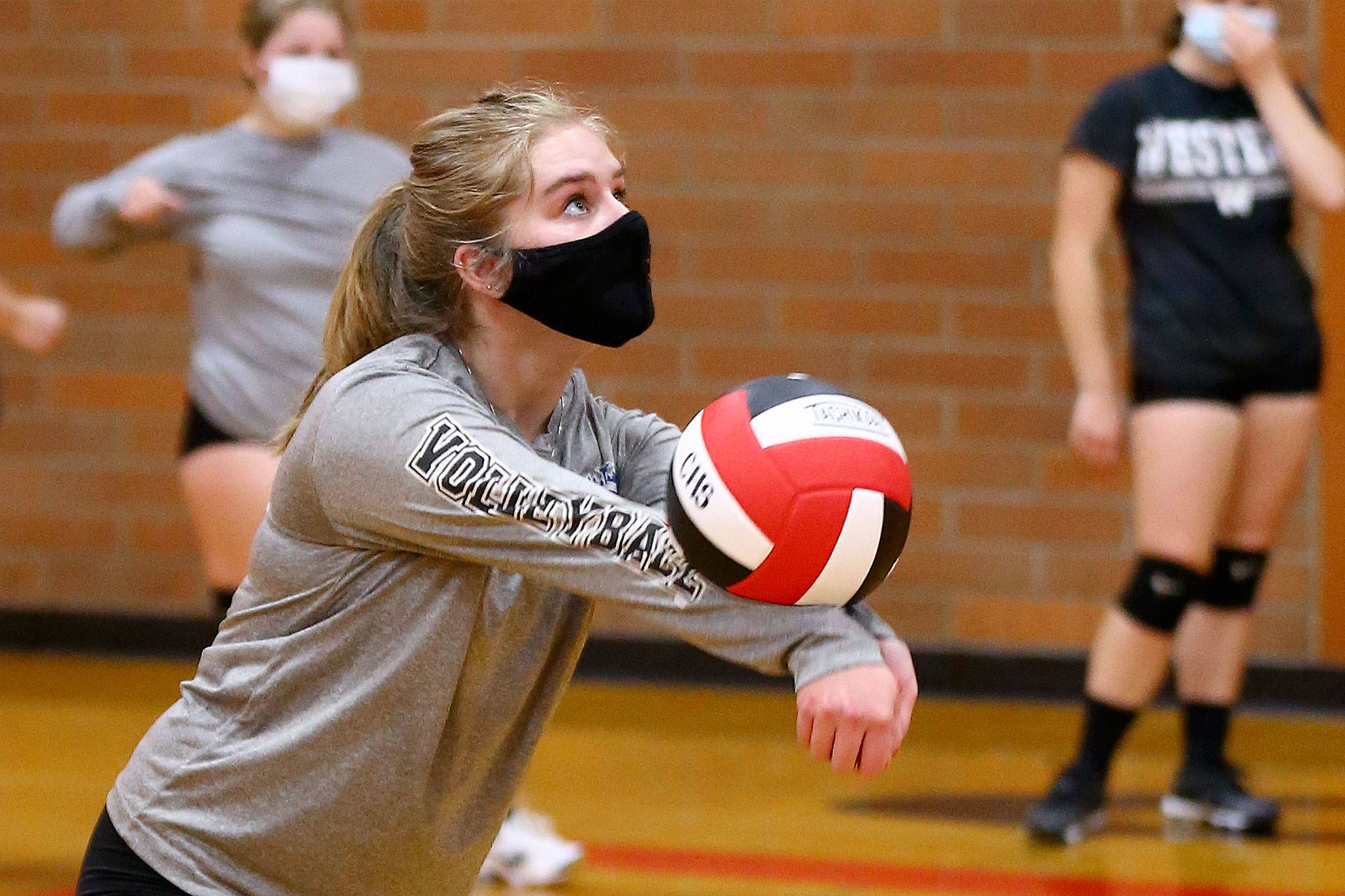 Coupeville High School’s Jordyn Rogers passes during a volleyball drill Tuesday. (Photo by John Fisken)