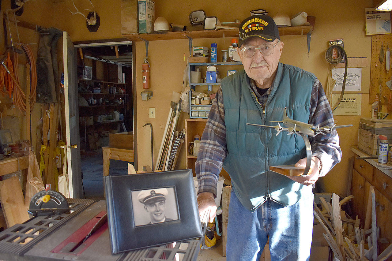 Photo by Emily Gilbert/Whidbey News-Times
Cmdr. Clayton Engebretsen served in the Navy during World War II, flying critical supplies all over the world. He now lives in Freeland.