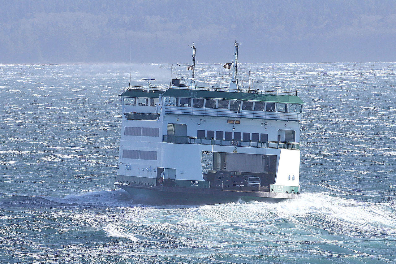 The state ferry “Salish” embarks on a rocky trip from Coupeville to Port Townsend during last Friday’s windstorm. Power to Whidbey was knocked out from Friday afternoon to early Saturday morning. Photo by John Fisken