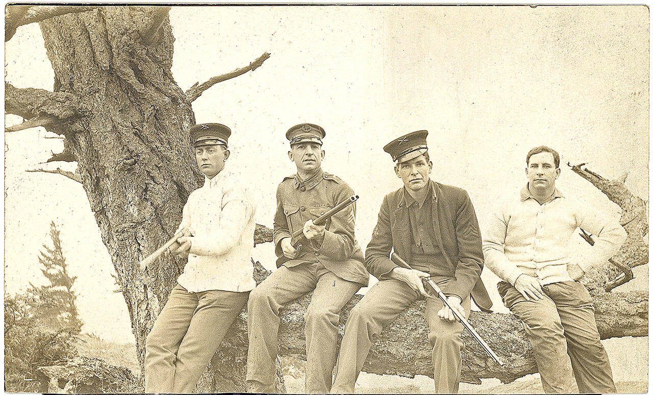 Mathew English, second from right, seen with three other soldiers during a hunt in Central Whidbey with the civiliam arms they were permitted to have. Photo courtesy Steven Kobylk