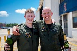 Lt. j.g. William McIlvaine, left, celebrates after graduating from flight school. He was killed in a training accident in March 2013. His uncle, Phelps McIlvaine, donated a monument to Oak Harbor in honor of all service members who died while serving in Prowler squadrons. Photo courtesy Phelps McIlvaine
