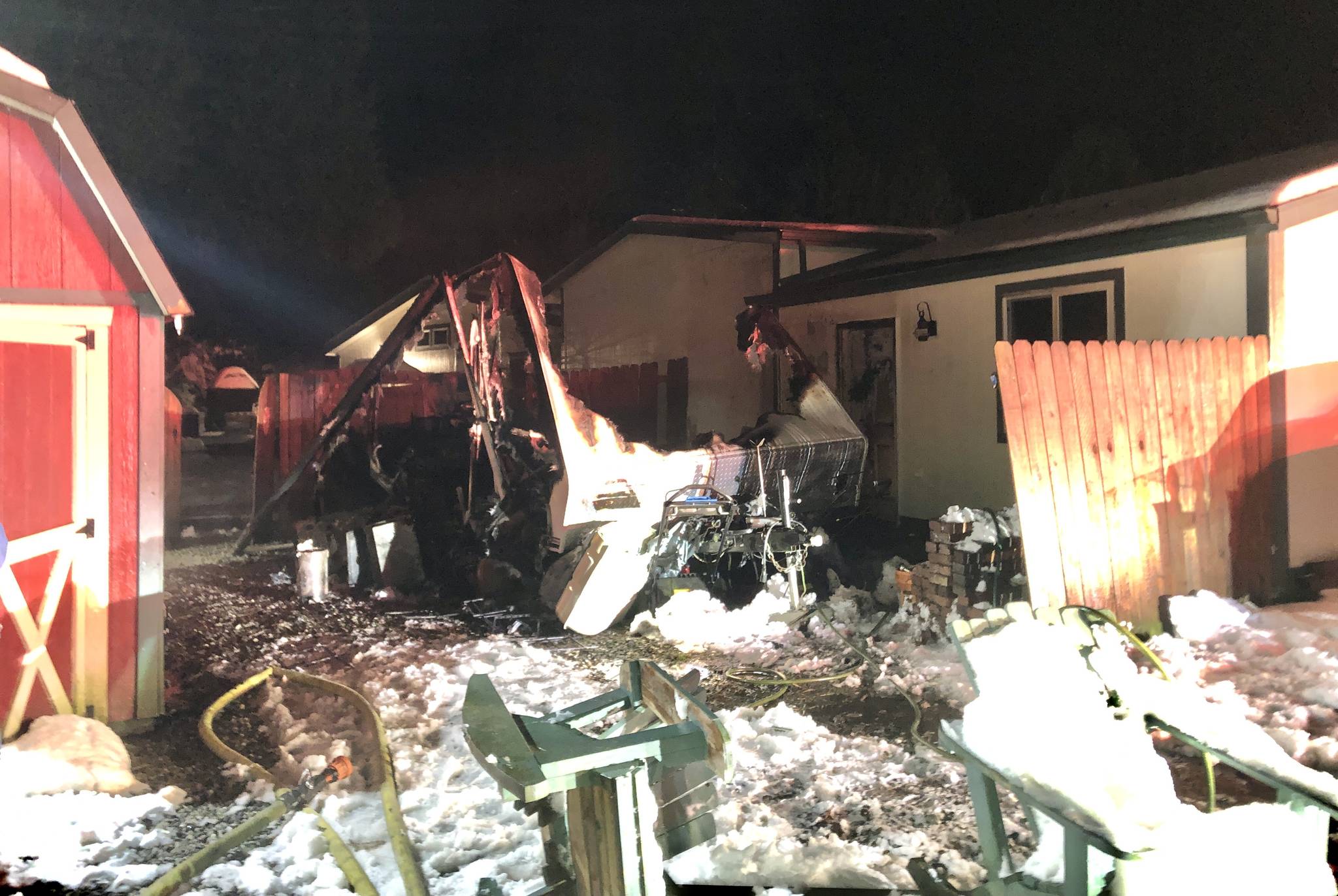 A fire Sunday evening fully engulfed a trailer at a Deer Lake Road residence. No one was injured. Photo provided by South Whidbey Fire/EMS