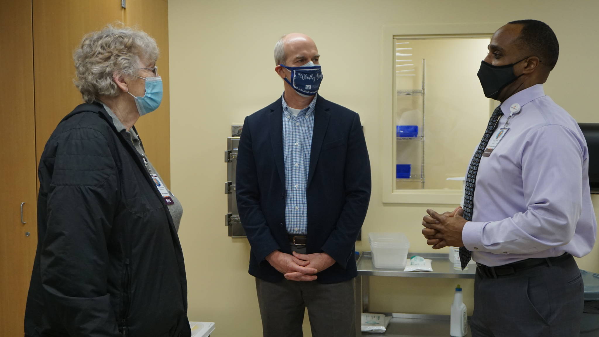 Photo by WhidbeyHealth
U.S. Rep. Rick Larsen, with WhidbeyHealth Commissioner Grethe Cammermeyer and pharmacy director Dr. Tony Triplett discuss vaccine processes during Larsens visit last Friday.