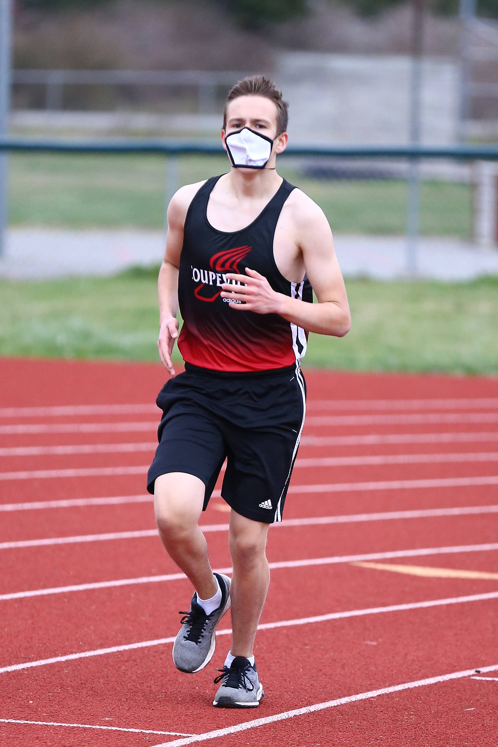 Coupeville Track - Photo by John Fisken
Coupeville's track and field team kicked off spring sports Thursday, March 4. The Wolves hosted the Northwest 2B/1B League season opener at Mickey Clark Stadium.